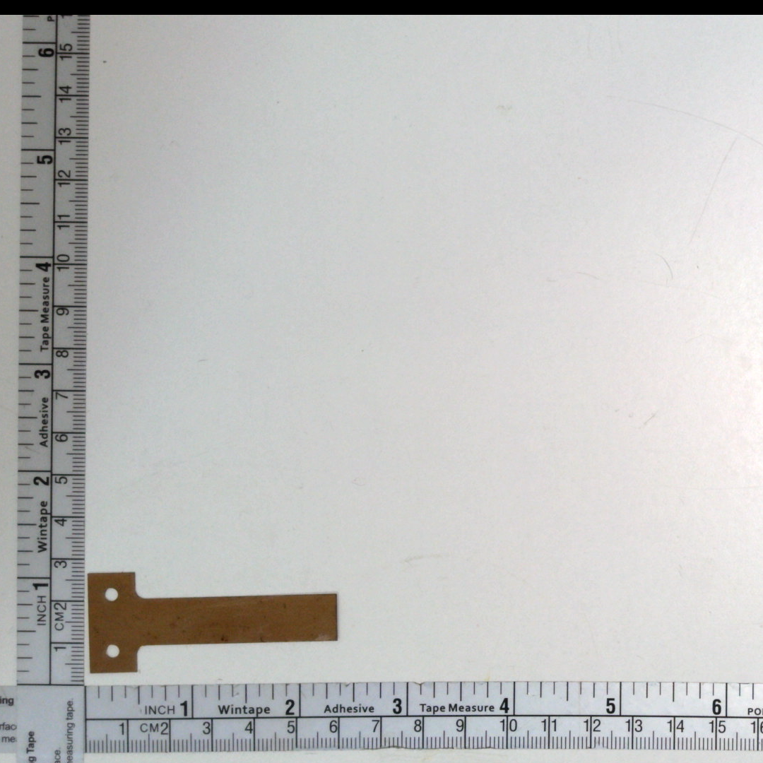 Spring - flat drop target tensioner 